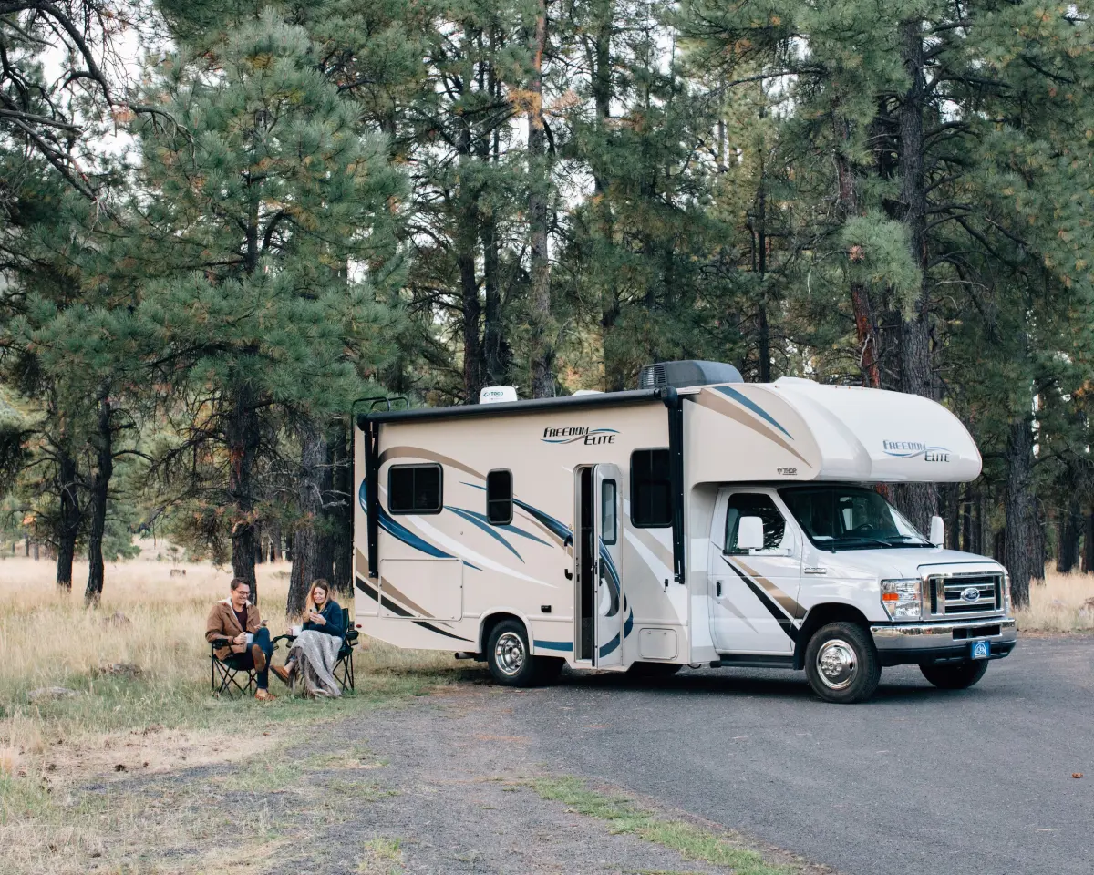 RV and people drinking coffee