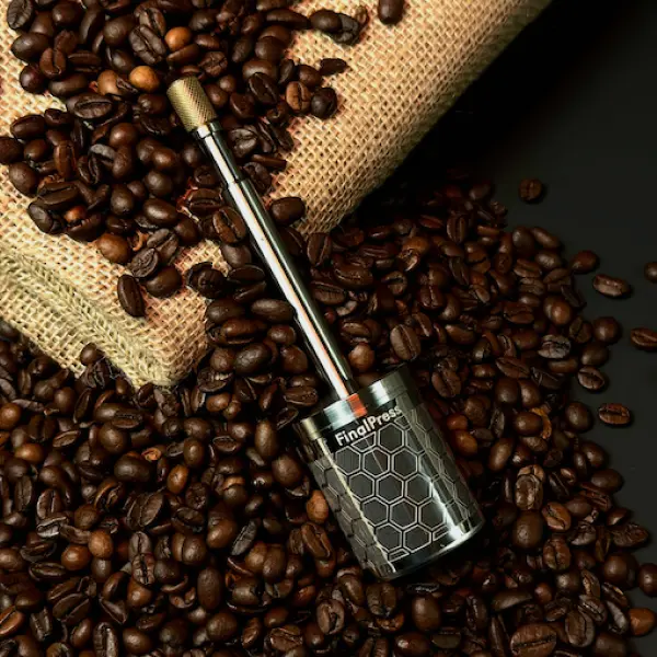 FinalPress on top of coffee beans