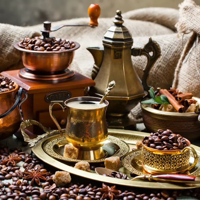 Dallah, coffee grinder and a 