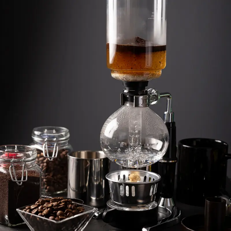 vaccuum coffee maker brewing coffee